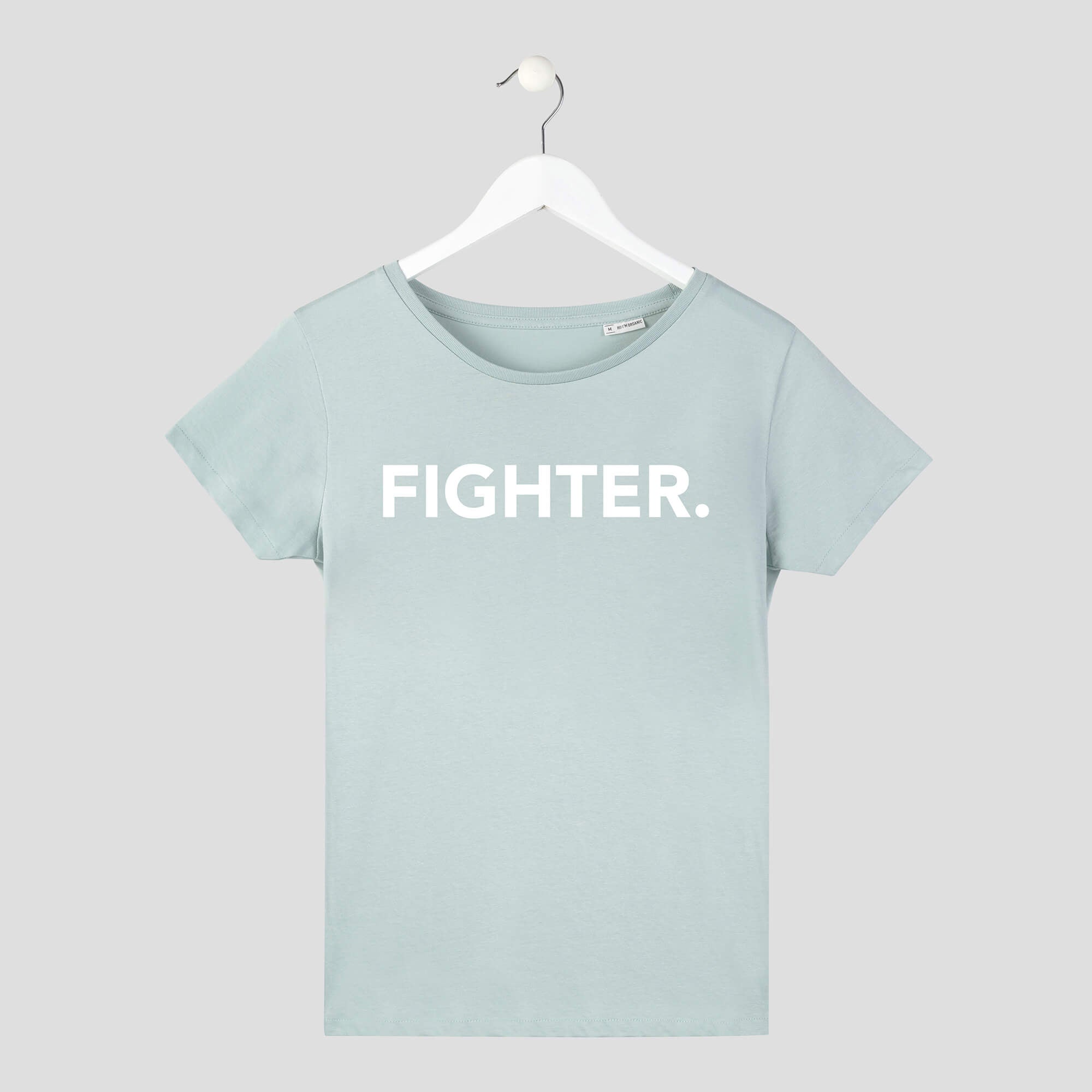 Camiseta minimalista de chica fighter color verde pecho